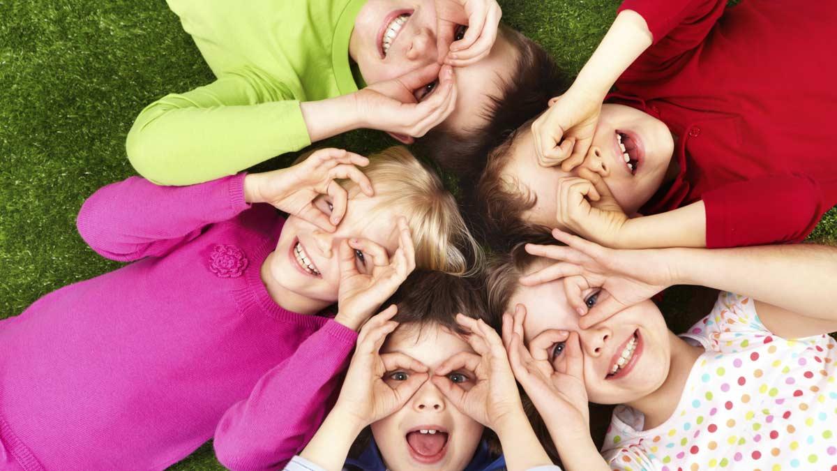 Children laying in a circle