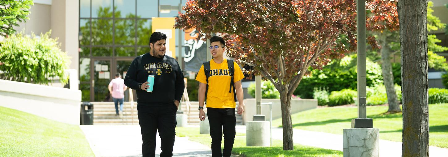 Students walk from the University Place building.